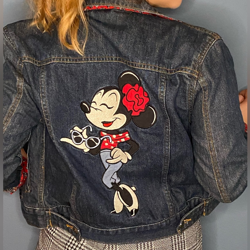 Authentic Disney parks Minnie Mouse Jean jacket with embroidered Minnie name.